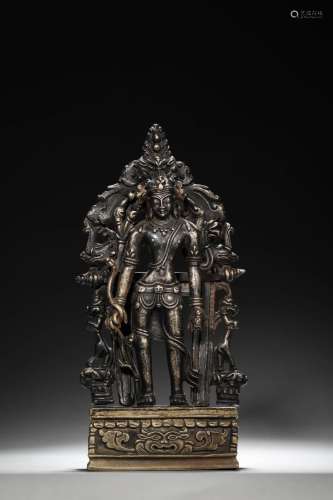 A silver-inlaid copper Guanyin bodhisattva statue