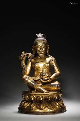 A gilding copper buddha statue