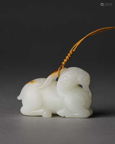 A jade goat ornament