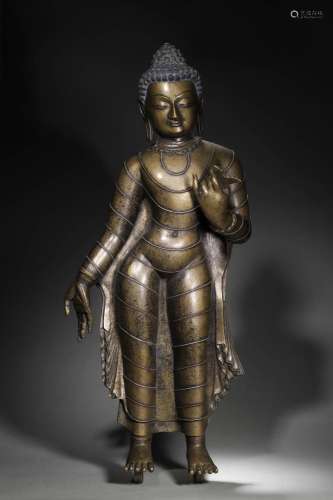A silver-inlaid copper Sakyamuni buddha statue