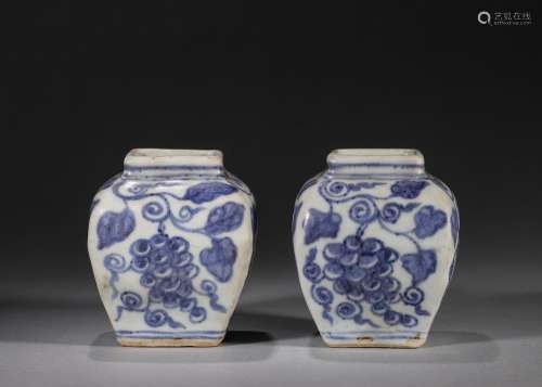 A pair of grape patterned blue and white porcelain jars