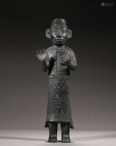 A bronze standing figurine