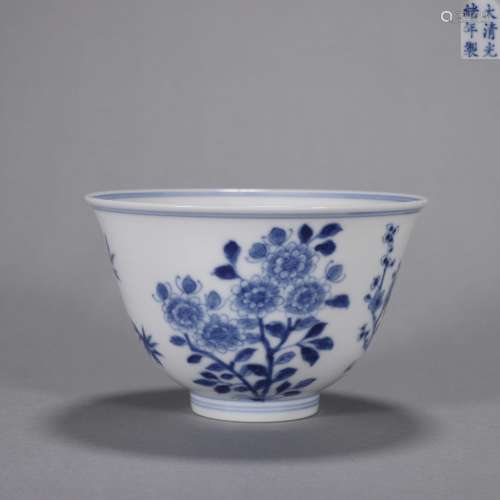 A blue and white flower and dragon porcelain cup