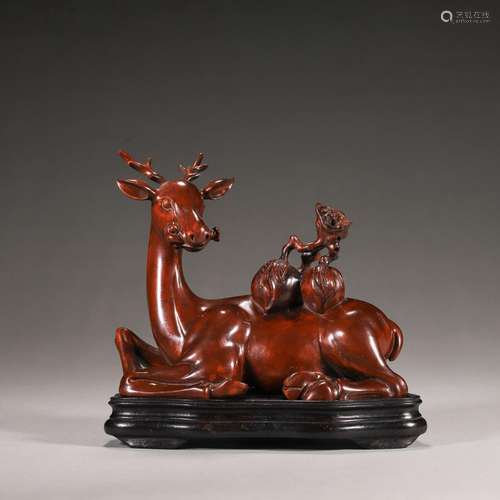 A boxwood deer shaped ornament