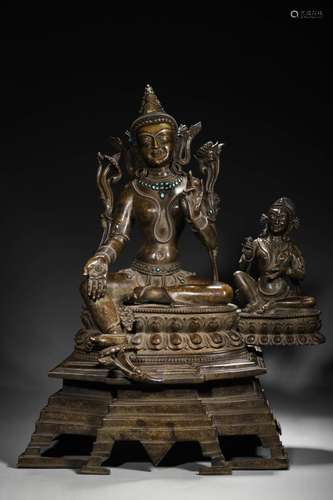 A gem and silver-inlaid copper green tara statue