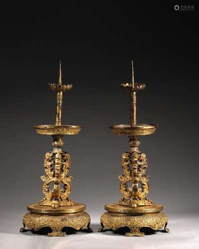 A pair of phoenix bird patterned gilding copper candlesticks