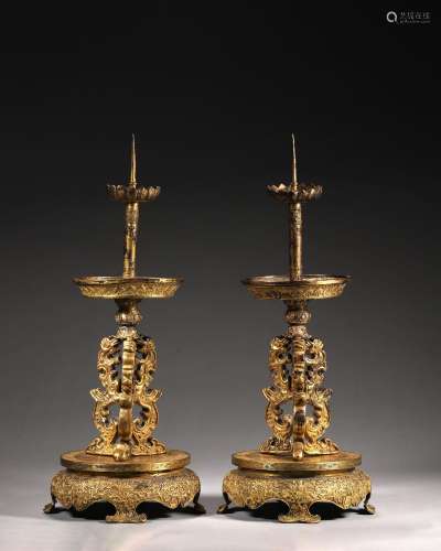 A pair of phoenix bird patterned gilding copper candlesticks