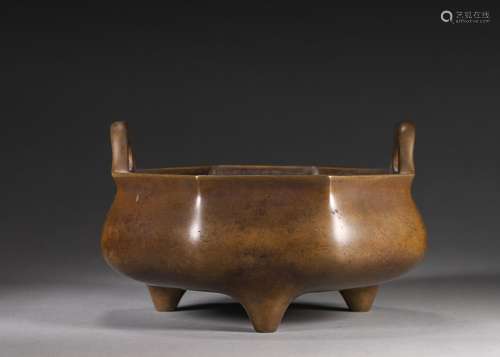 An octagonal double-eared copper censer