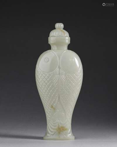A fish patterned jade vase