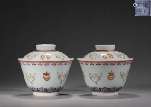 A pair of famille rose porcelain covered bowls, Yongzheng pe...