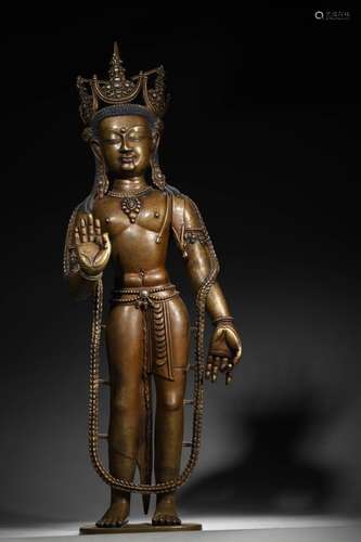 A silver-inlaid copper Guanyin bodhisattva statue