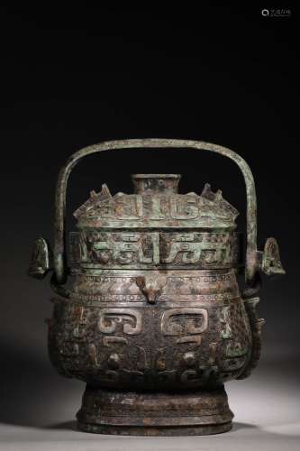A taotie patterned loop-handled bronze pot