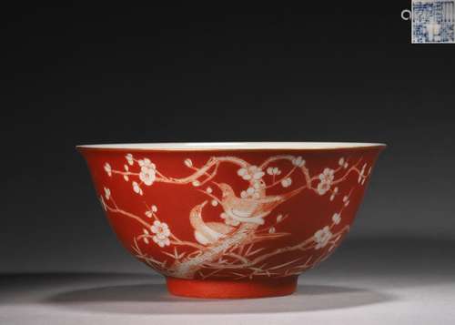 An iron red ground white plum blossom porcelain bowl, Yongzh...