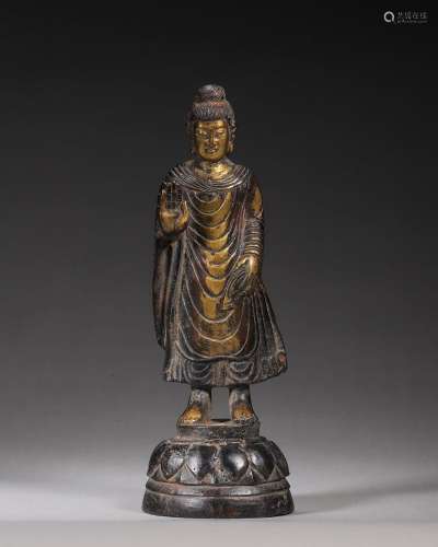 A gilding copper buddha statuette