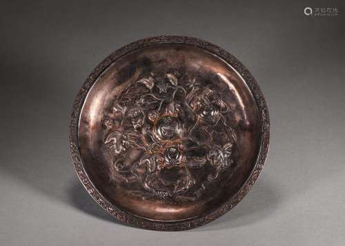 A pomegranate patterned silver plate