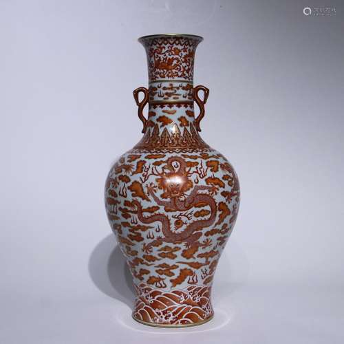 An allite red glazed 'dragon' vase