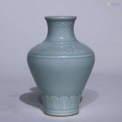 A celadon-glazed vase