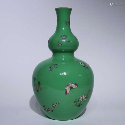 A green ground famille-rose 'floral' gourd-shaped vase