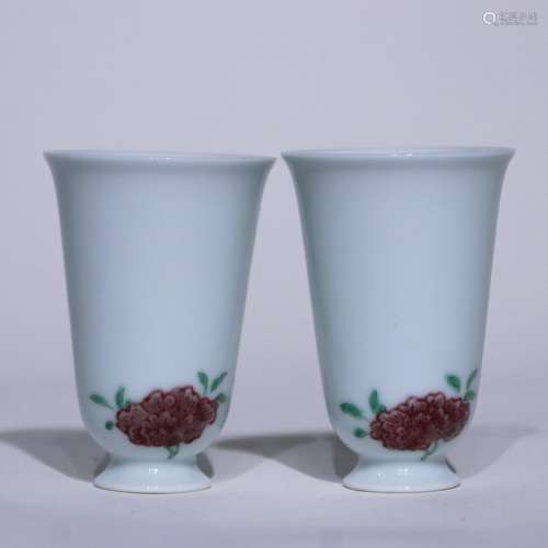A pair of Wu cai copper-red-glazed cup