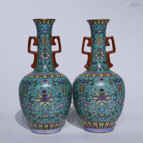 A pair of green ground famille-rose 'lotus' vase