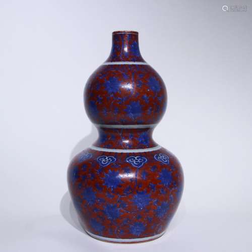 A red ground blue and white gourd-shaped vase