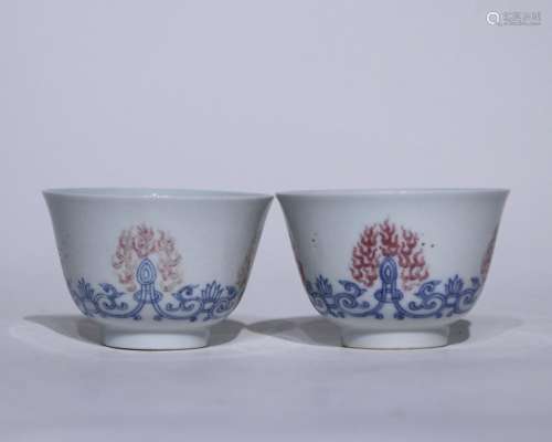 A pair of underglaze-blue and copper-red cup