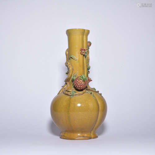 A yellow glazed vase