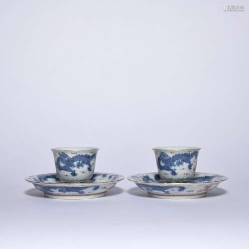 A pair of blue and white 'drgaon' teacup and holder