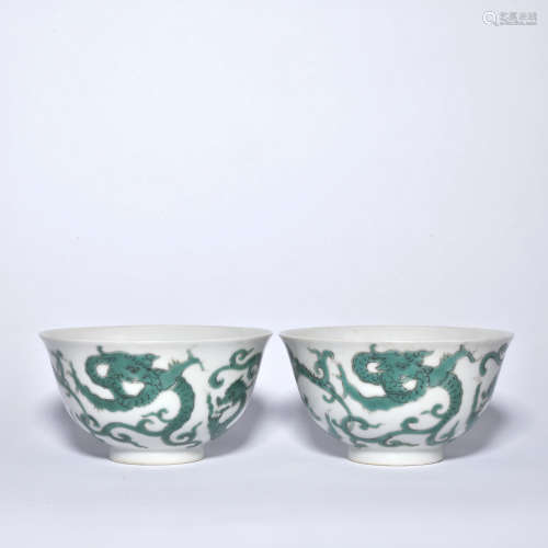 A pair of green glazed 'dragon' bowl