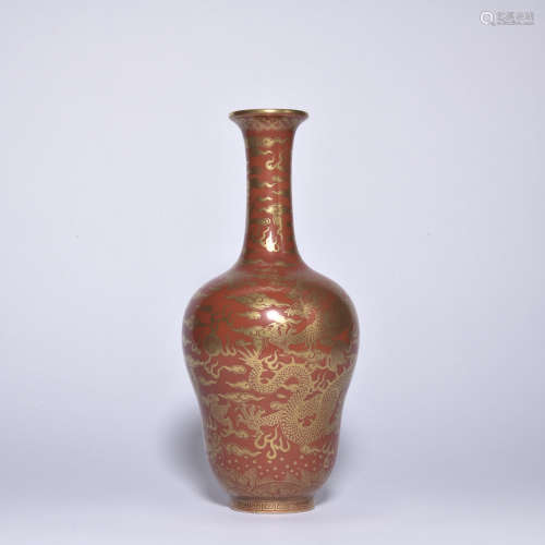An allite red glazed 'dragon' vase painting in gold