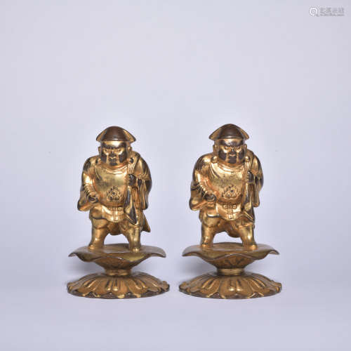 A pair of gilt-bronze figure