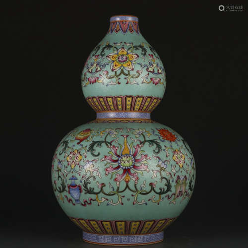 A famille-rose 'floral' gourd-shaped vase