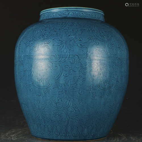 A blue glazed 'lotus' jar