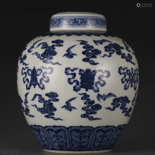 A blue and white 'bats' jar and cover