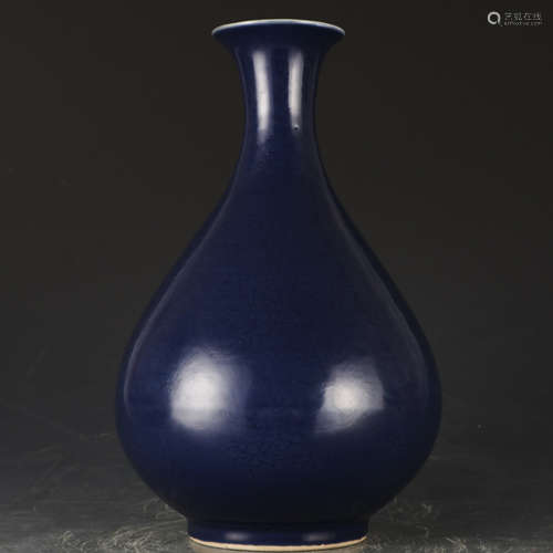 A blue glazed pear-shaped vase