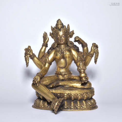 A gilt-bronze statue of six arm Avalokitesvara