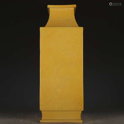 A yellow glazed vase