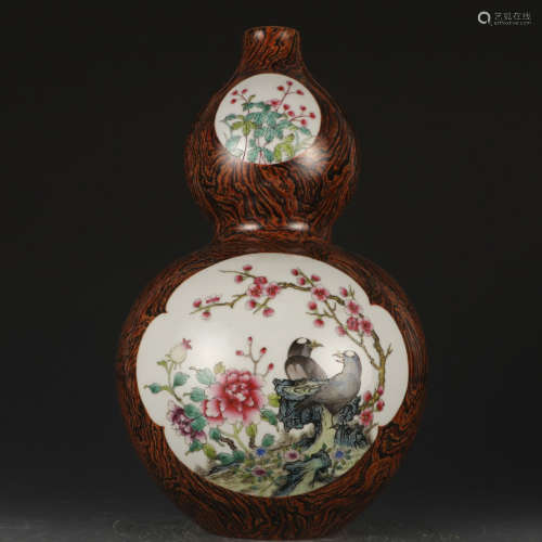 A wooden glazed famille-rose 'floral' vase