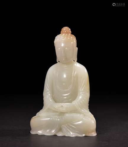A Seated Statue of Sakyamuni Carved in White Jade