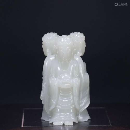 Hetian jade three-faced Buddha statue