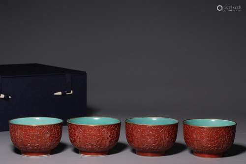 A set of four "Yongzheng Imperial System" red-glaz...