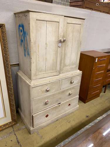 A Victorian painted pine two door press cupboard, width 97cm...