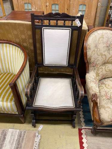 A late 19th century American rocking chair, width 56cm, dept...