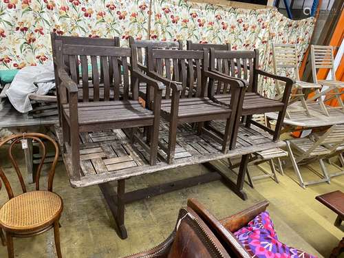 A rectangular weathered teak garden table, length 212cm, wid...