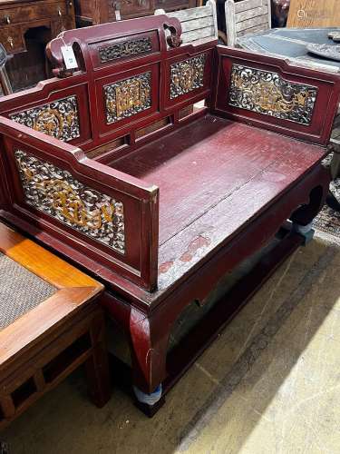 A Chinese scarlet lacquer parcel gilt bench, length 125cm, d...