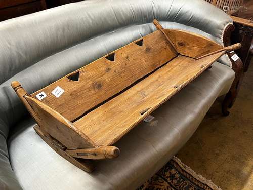 A 19th century French pine rocking crib, length 87cm, depth ...