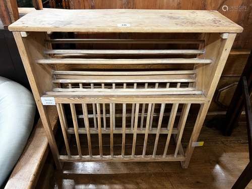 A 19th century provincial pine plate rack, width 57cm, depth...