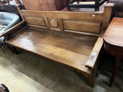 A 19th century Continental panelled settle, length 187cm, de...