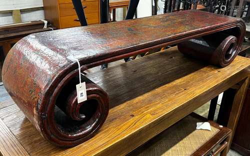 A Chinese lacquer scroll end low table, width 146cm, depth 3...