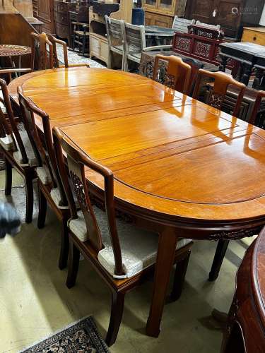 A Chinese hardwood extending dining table, length 214cm, wid...